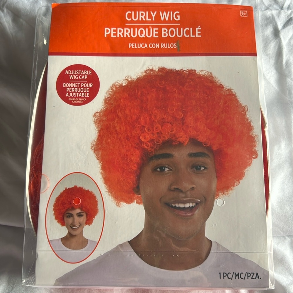Bright orange curly wig adjustable size ages 6- adult
